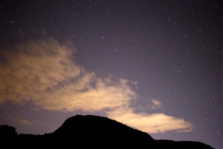 Sharp Hill Under Night Sky photo