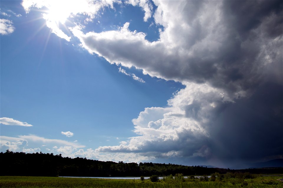 Thick Clouds Clearing to Blue Sky photo