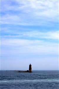 Lighthouse at Sea photo
