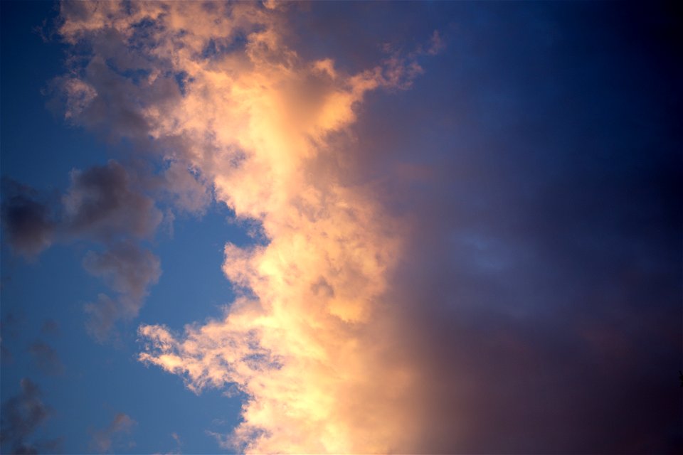 Sunlit Edge of Large Cloud photo
