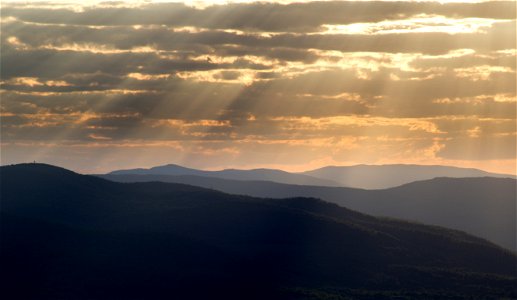Streaming Sunbeams Over Mountains photo