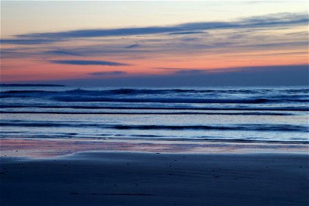Peaceful Striped Sunrise Landscape at the Beach photo