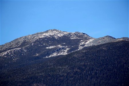 Snow Fallen Across Mountain Range photo