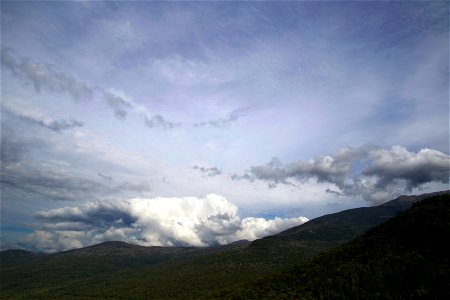 Cloudy Skies Over Mountains photo