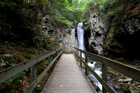 Wooden Walkway Leading to Waterfall photo