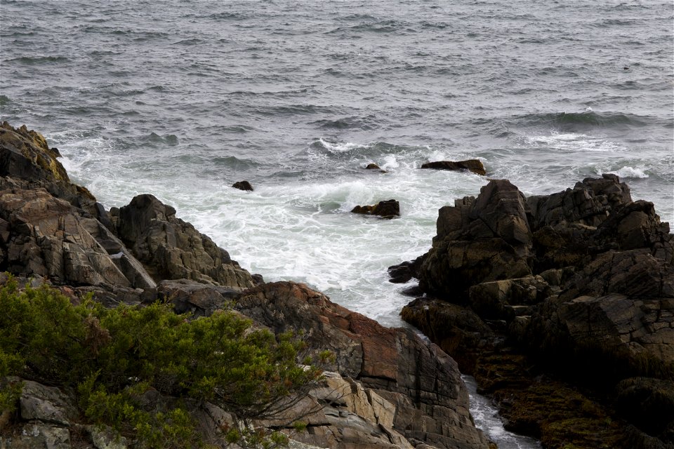 Waves Coming In On Rocky Shore photo