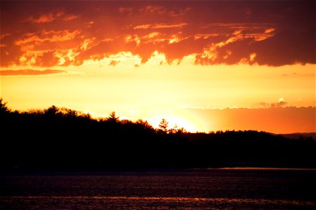 Vibrant Sunset Over Lake photo