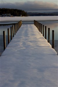 Snowy Dock by the Lake photo