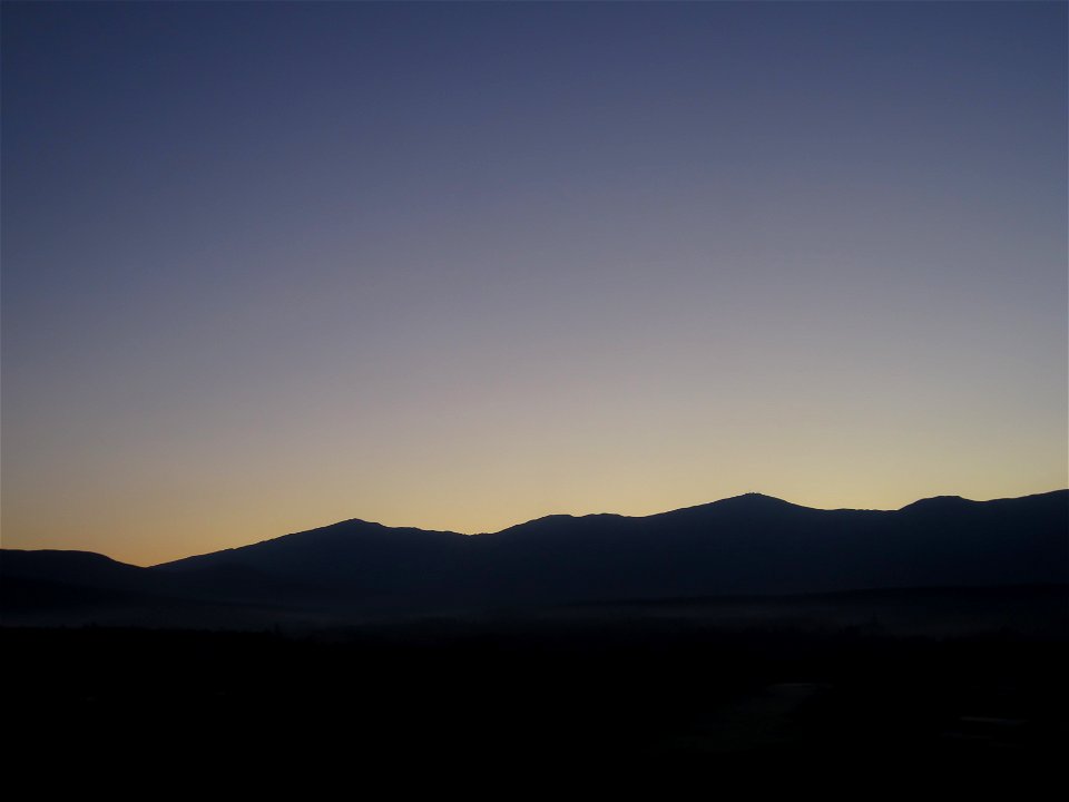 Gradient Sky and Mountain Silhouette photo