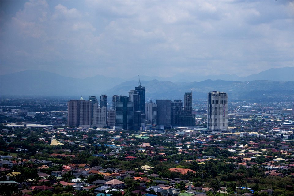 Few Tall Buildings At Center Of Urban Area photo