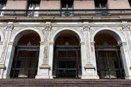 Old Building With Three Iron Gates In Arches