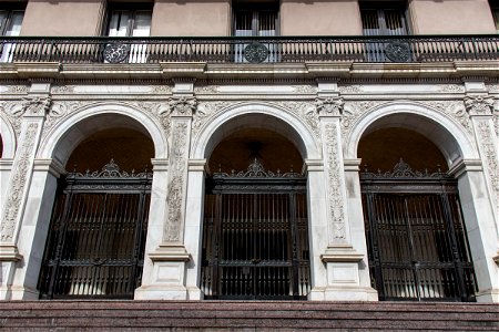 Old Building With Three Iron Gates In Arches photo