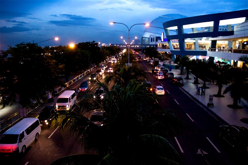 Traffic In Divided Highway In Manila At Dusk photo
