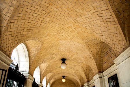 Patterned Ceiling Above Arched Passageway photo