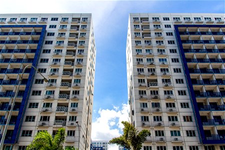 Two Identical Apartment Buildings In Manila