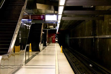 Empty Subway Platform With Escalators photo