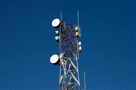 Satellite Dishes On Radio Tower photo