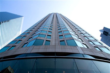 Facade Of Tall Building Against Sky photo