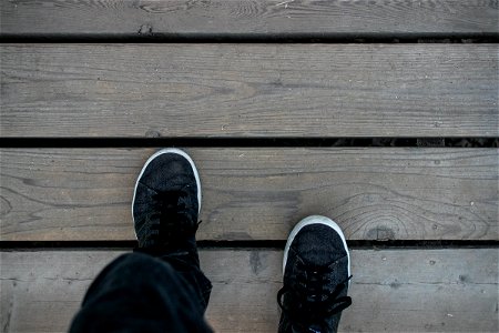 Feet Walking On Wood Boards photo