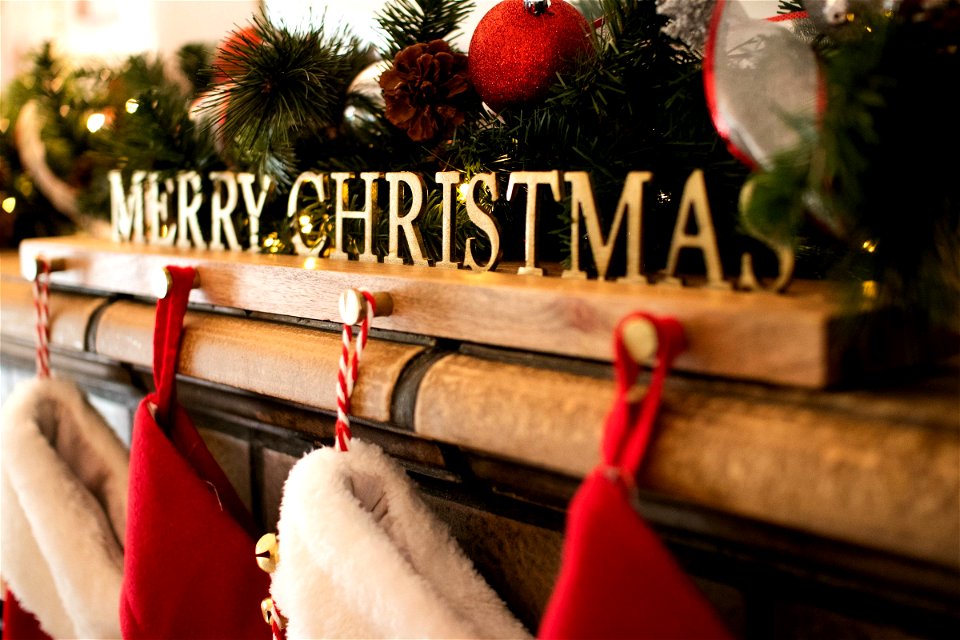 Christmas Decorations And Stocking Holder On Mantel