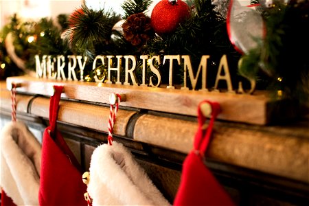 Christmas Decorations And Stocking Holder On Mantel photo