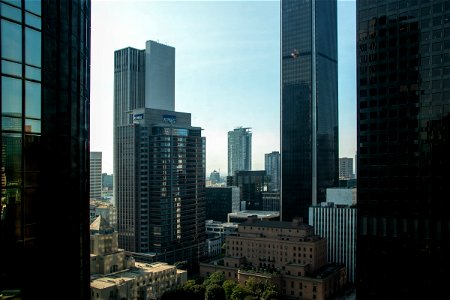 Tall City Buildings Against Sky photo