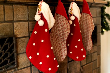 Four Stockings Hung On Mantel photo