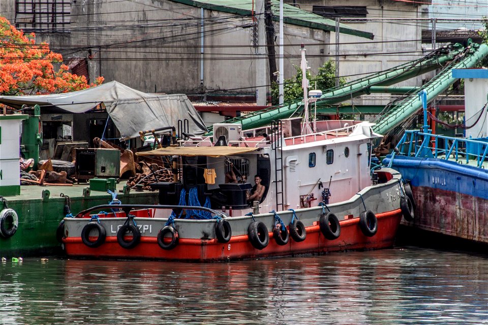 Large Boat Moored Near Buildings photo