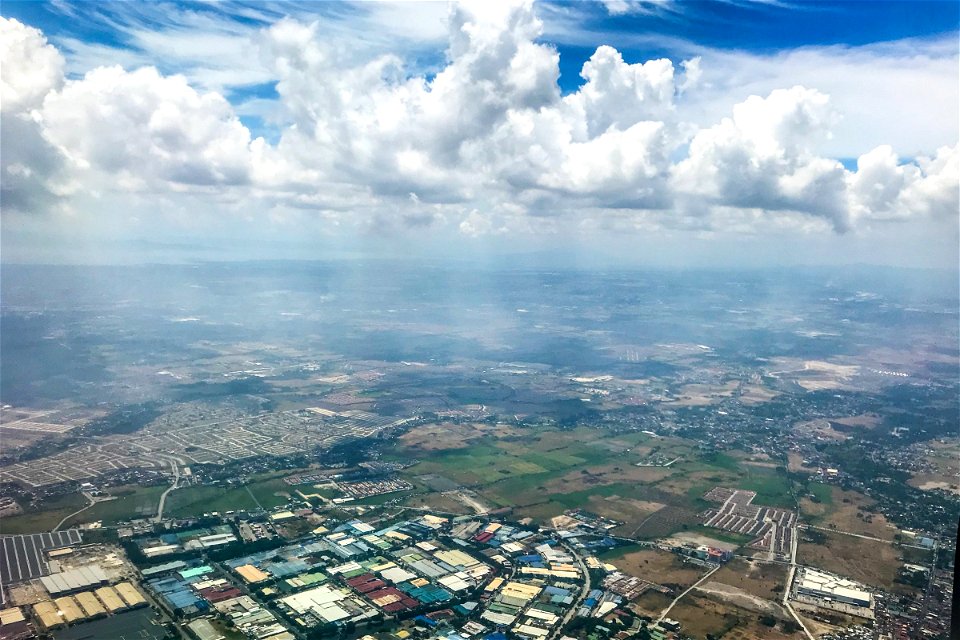 White Clouds Above Urban Area photo