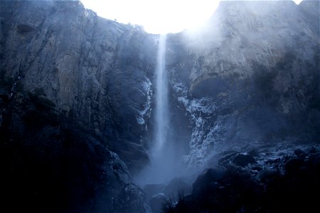 Long Waterfall Streaming Down Rock Cliff