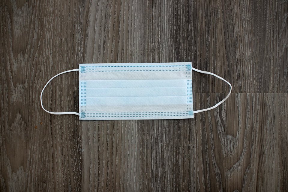 Surgical Face Mask On Wood