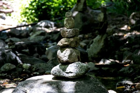 Stacked Rocks On Boulder In Nature photo