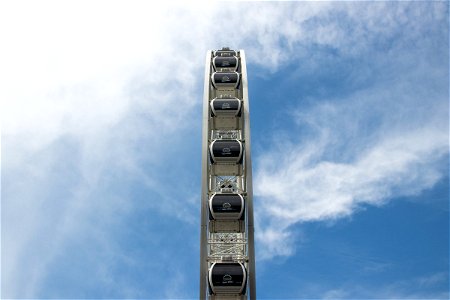 Side Of Ferris Wheel Against Sky