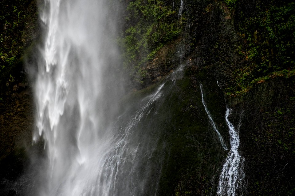 Misty Waterfall On Mossy Cliff photo