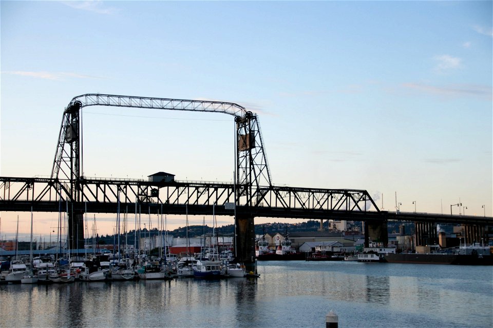Bridge Near Boats In Harbor photo