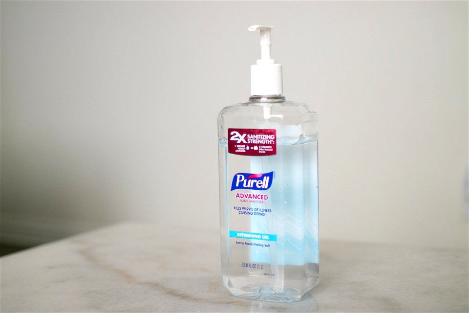 Bottle Of Hand Sanitizer On Marble Surface