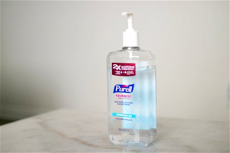 Bottle Of Hand Sanitizer On Marble Surface