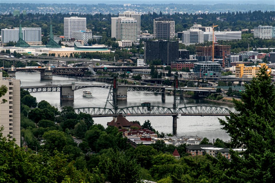 Bridges Crossing River In City photo