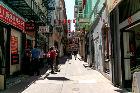 Group Of People Standing In Chinatown Street photo