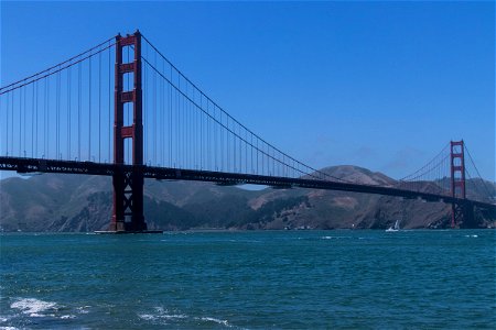 Hills Behind Towers Of Golden Gate Bridge photo