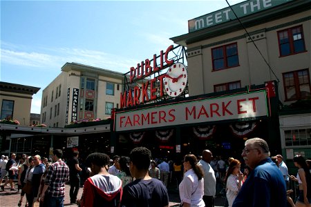 People Strolling Through Pike Place Market