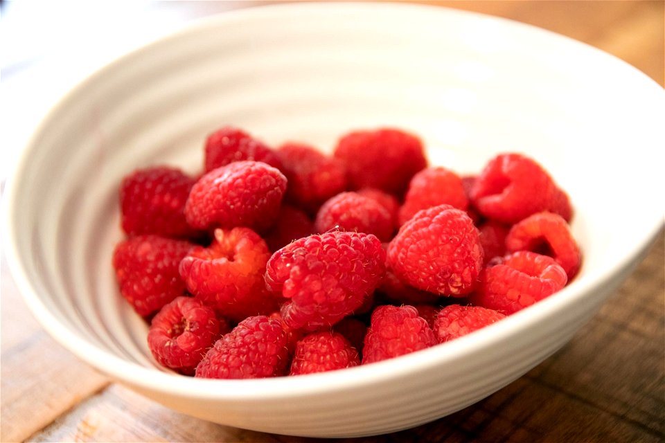 Raspberries In White Bowl photo