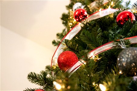 Ornament Decorations On Lit Pine Tree photo