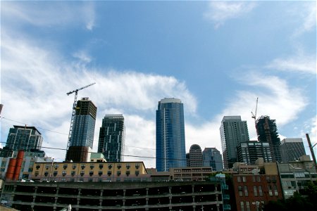 Buildings Under Construction And Tower Cranes photo