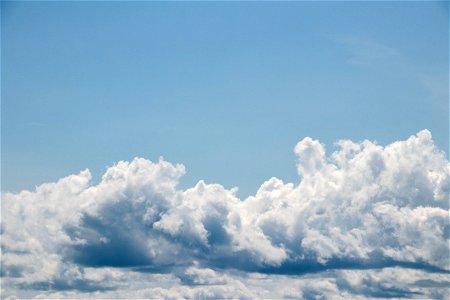 Compact Clouds In Blue Sky