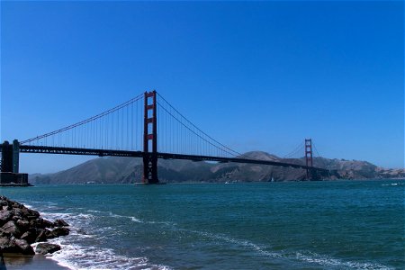 Golden Gate Bridge Between Mountains And Water photo