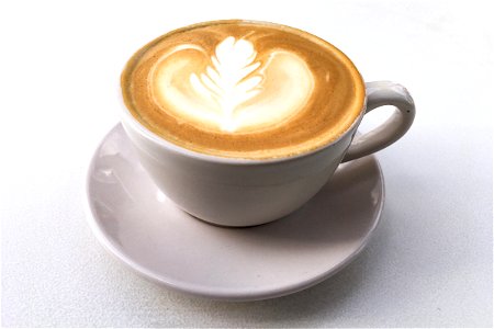 Leaf Latte Art In Coffee Cup photo