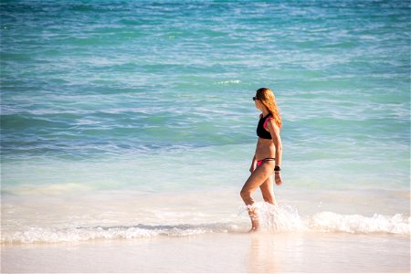 Woman On Sandy Beach photo