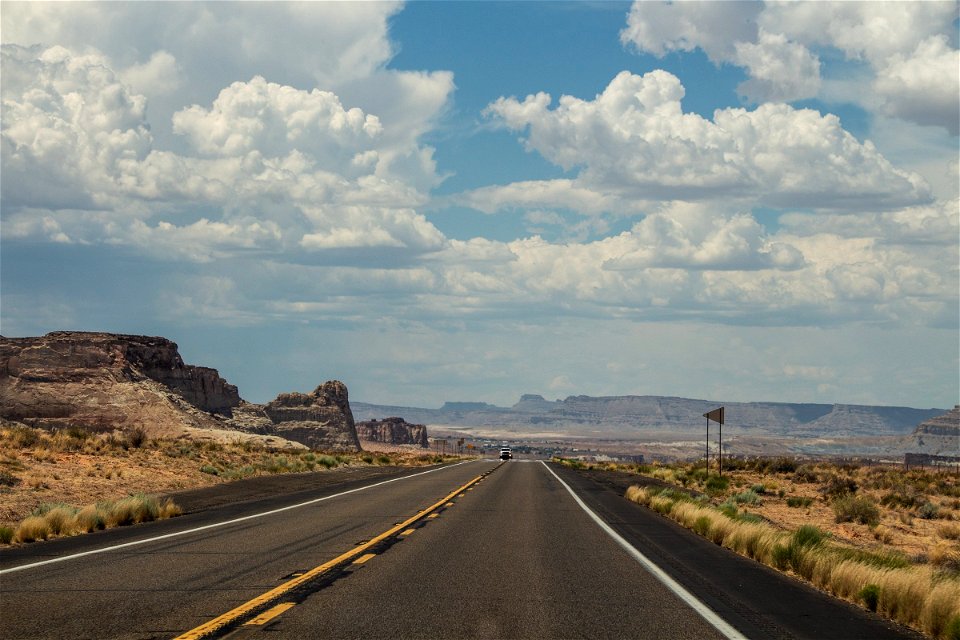 Highway In Desert Near Mountains photo