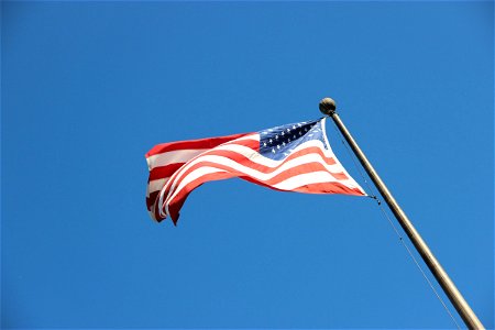 American Flag Flapping In Wind photo